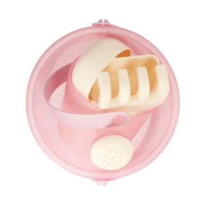 Pink plastic toy with a curved white handle and beige ribbed nipple-like piece, resembling a baby feeding accessory.
