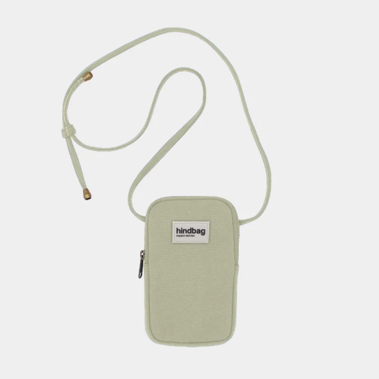 Beige small crossbody bag with a long adjustable strap, zipper on the side, and a front brand patch reading 'hindbag'.