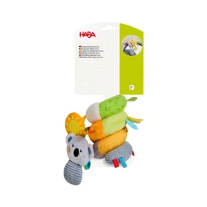 Soft, colorful plush caterpillar toy for babies with multiple fabric segments; package shows the HABA brand.