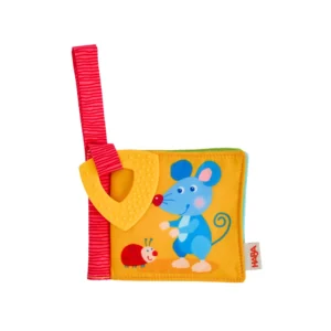 HABA Μαλακό Βιβλίο Animal Friends με Μασητικό 6+ Μηνών Το HABA μαλακό βιβλίο Animal Friends είναι ένα χαριτωμένο αισθητηριακό παιχνίδι για μωρά από 6 μηνών, γεμάτο ζωάκια που περιμένουν να τα ανακαλύψουν τα μικρά χεράκια. Με πρακτική θήκη Velcro, το βιβλίο προσαρμόζεται εύκολα σε καρότσι, κρεβατάκι ή κάθισμα αυτοκινήτου, καθιστώντας το ιδανικό για χρήση στο σπίτι ή στις βόλτες. Το ενσωματωμένο μασητικό στοιχείο προσφέρει ανακούφιση κατά την οδοντοφυΐα, ενώ οι μαλακές σελίδες ενθαρρύνουν την εξερεύνηση και το παιχνίδι. Ηλικία: 6+ μηνών Περιεχόμενα: Μαλακό βιβλίο με ζωάκια Extra: Μασητικό για οδοντοφυΐα Στερέωση: Velcro για καρότσι & κρεβατάκι Υλικό: Πολυεστέρας Καθαρισμός: Πλένεται στο πλυντήριο στους 30°C Ένα ιδανικό πρώτο βιβλίο για μωρά που συνδυάζει παιχνίδι, μάθηση και ανακούφιση. Description in English The HABA Soft Book Animal Friends is a cute sensory toy for babies aged 6+ months, filled with adorable animal characters to explore. Thanks to the practical Velcro loop, it can be easily attached to a buggy, cot, or car seat, making it perfect for home or on-the-go use. The integrated teething element helps soothe gums, while the soft pages encourage exploration and play. Age: 6+ months Material: Polyester Feature: Teether & Velcro attachment HABA Μαλακό Βιβλίο Animal Friends με Μασητικό 6+ Μηνών – Baby Sensory Toy