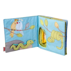 Soft fabric children's activity book opened to pages with birds on a branch, a winding snake, and a pocket with a yellow towel inside.